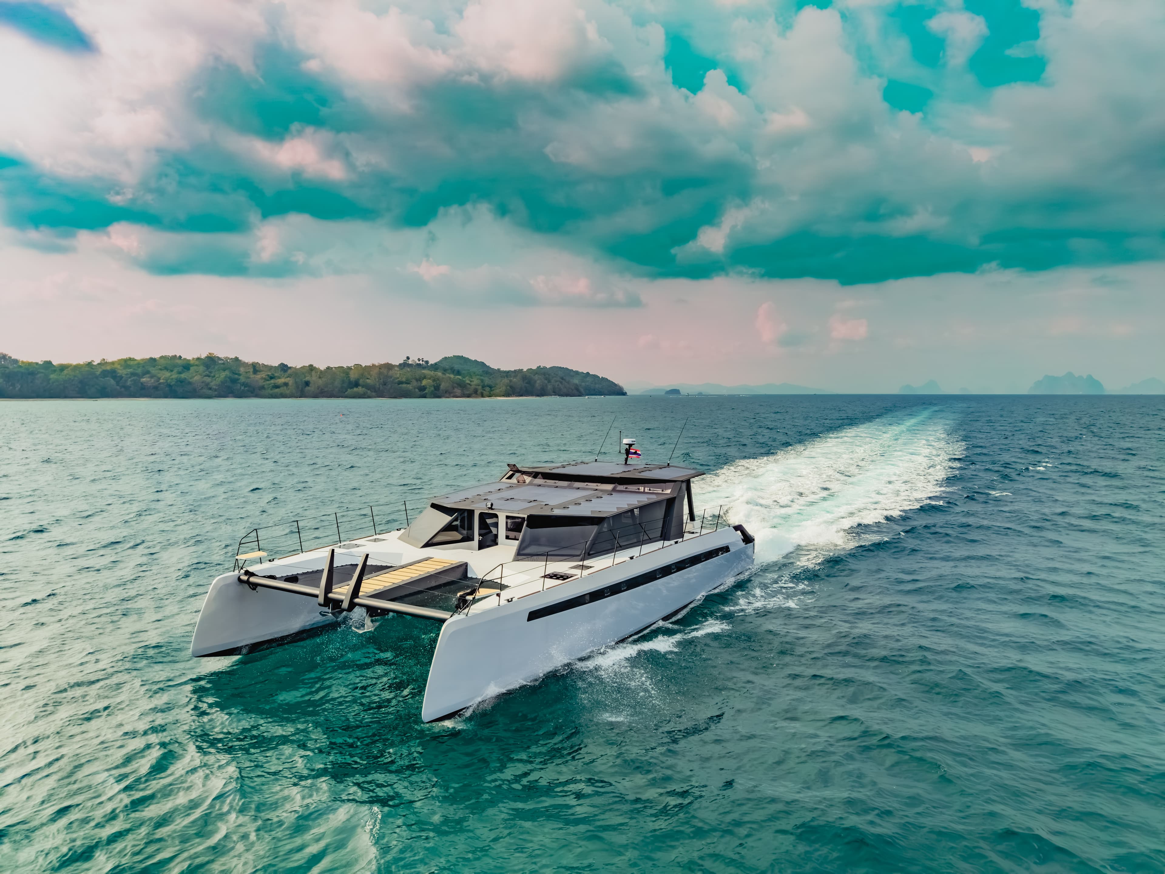 AY60 power catamaran aerial view — 60 ft composite catamaran cruising at sea